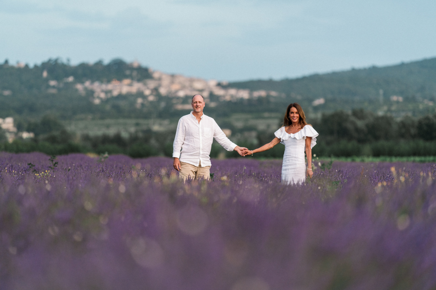 smiling couple in a lavender field in provence