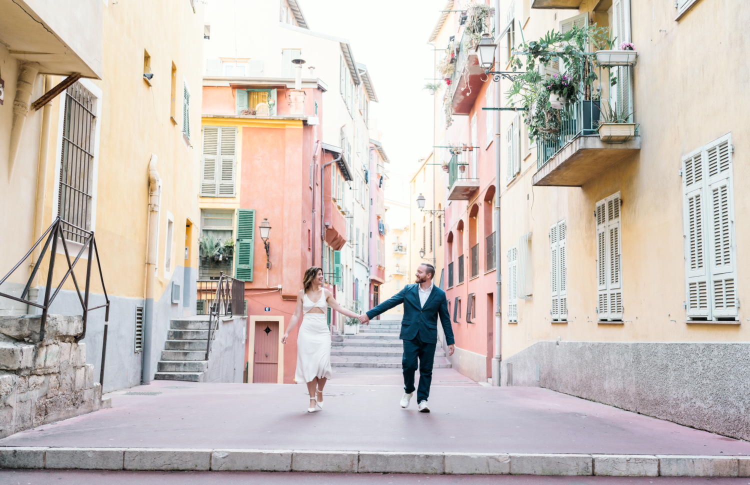 married couple walking on old town nice france