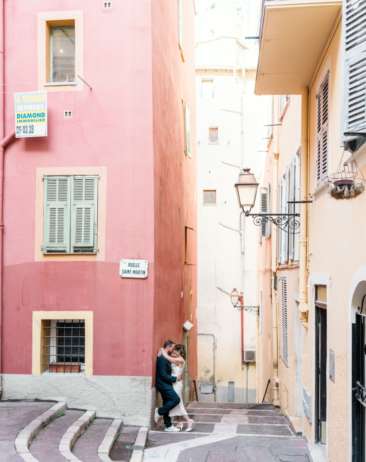 man and woman passionately embrace in old nice france