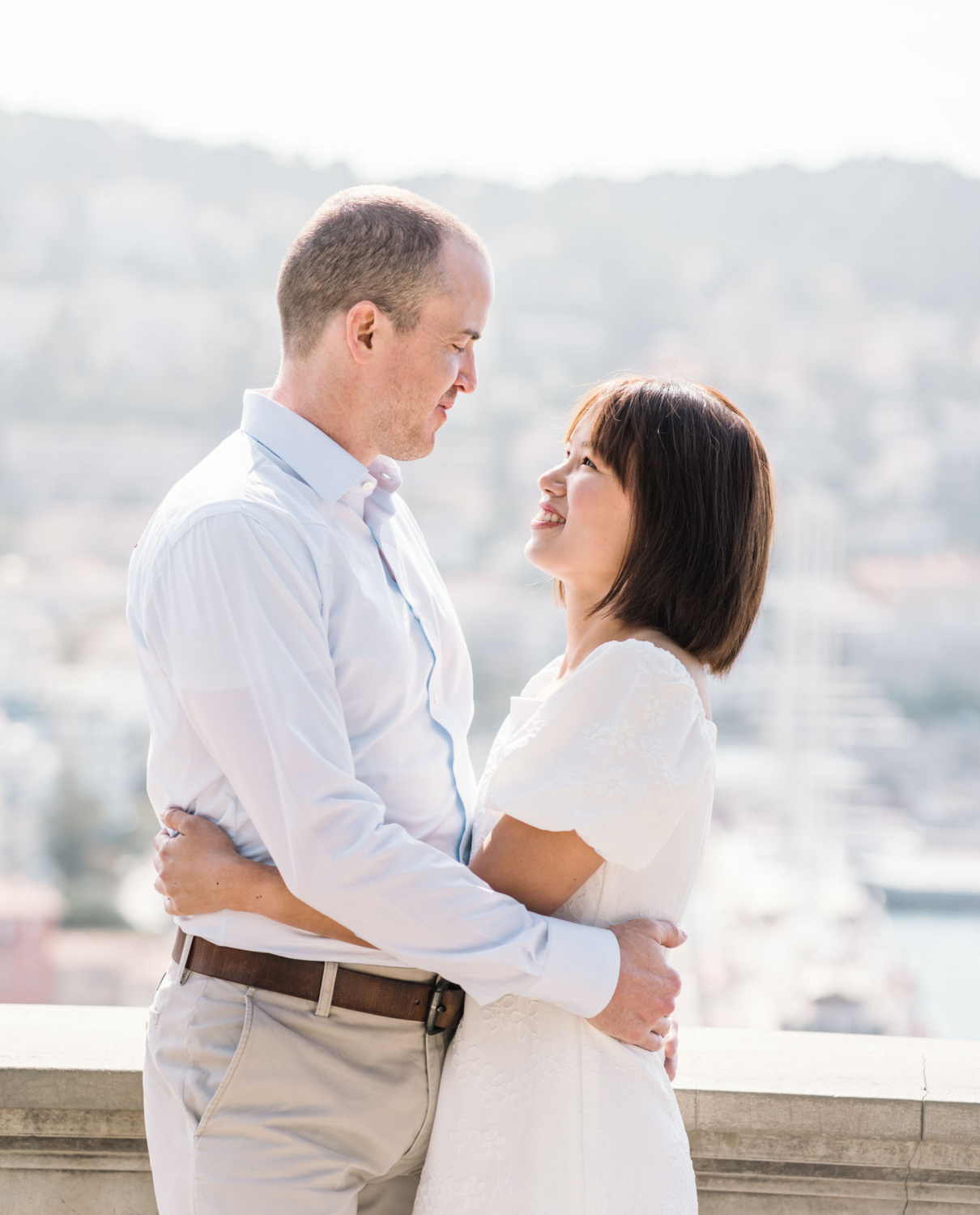 beautiful couple embracing in nice france