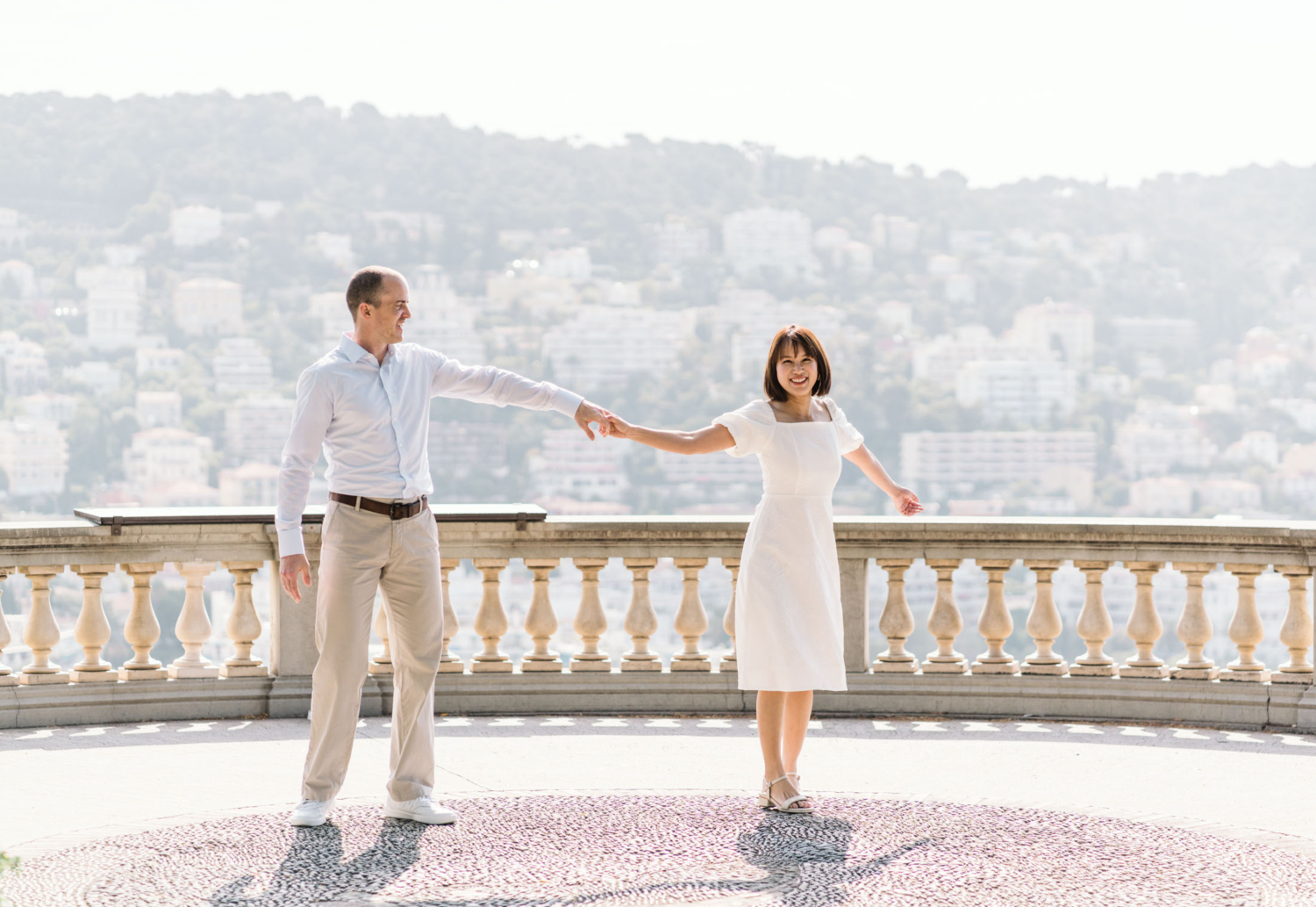 couple dancing with beautiful view in nice france