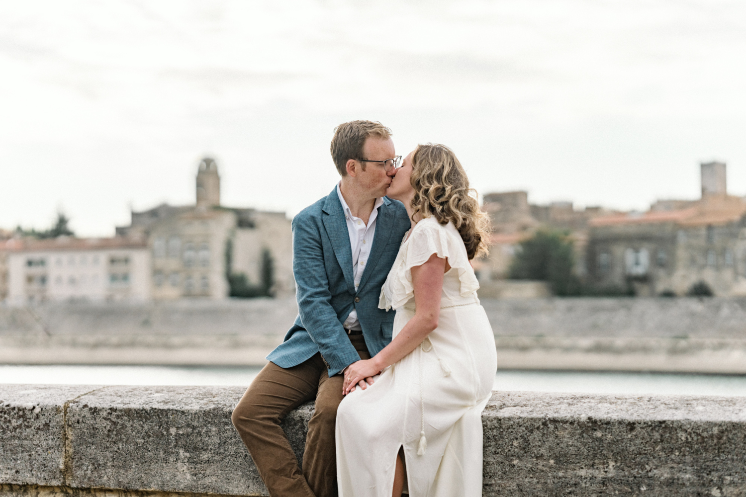 couple share passionate kiss in arles france