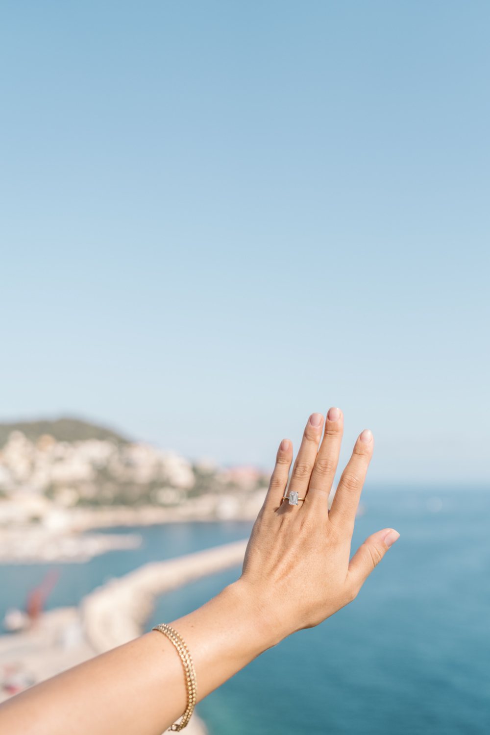 woman shows off her new diamond engagement ring in nice france