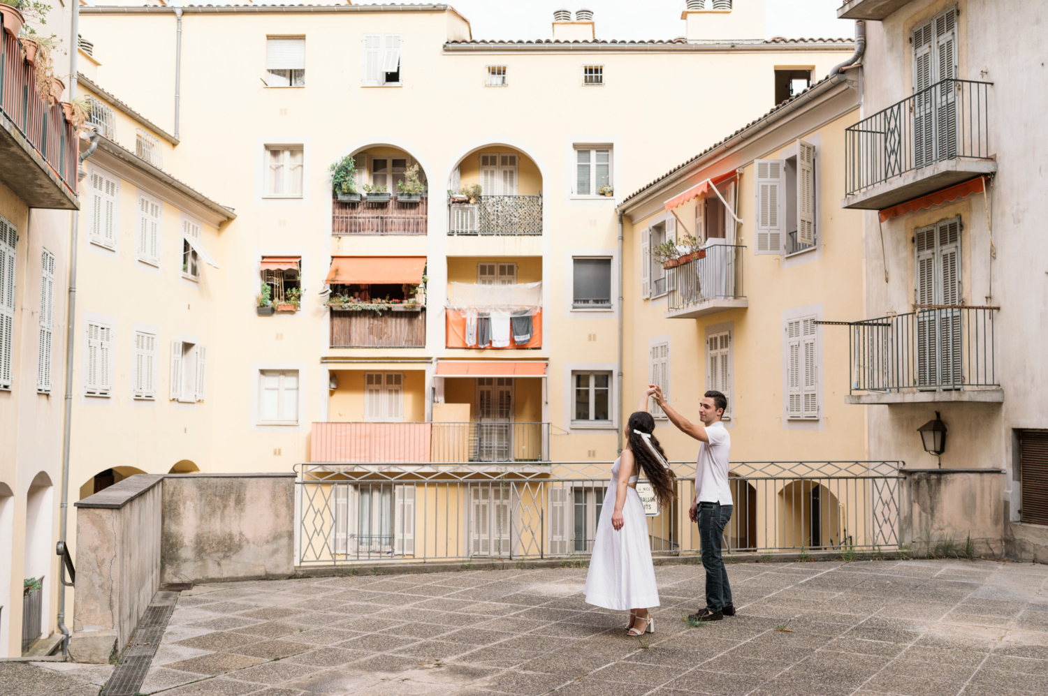 man spins woman in circle in nice france