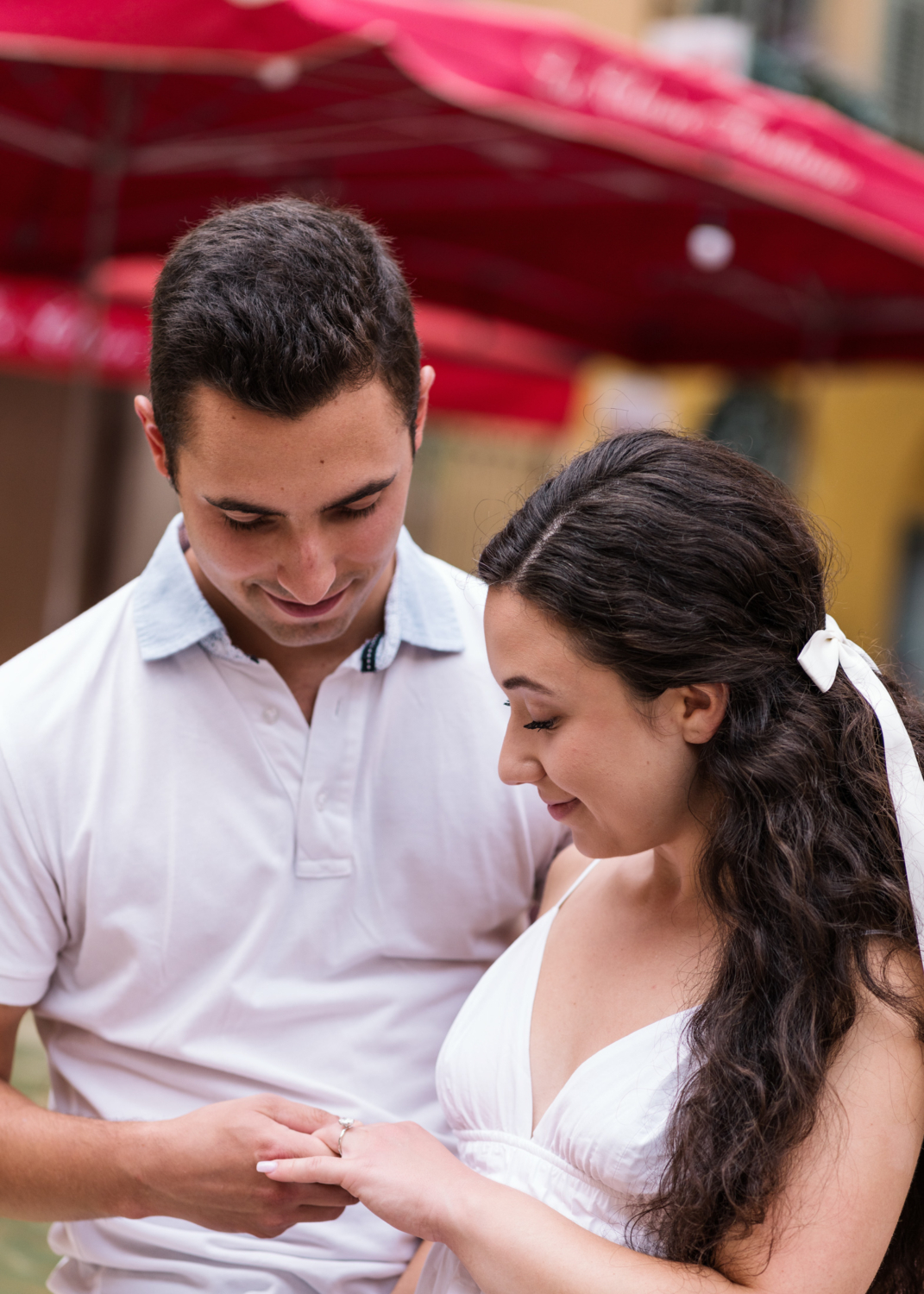 couple admire woman's engagement ring in nice france