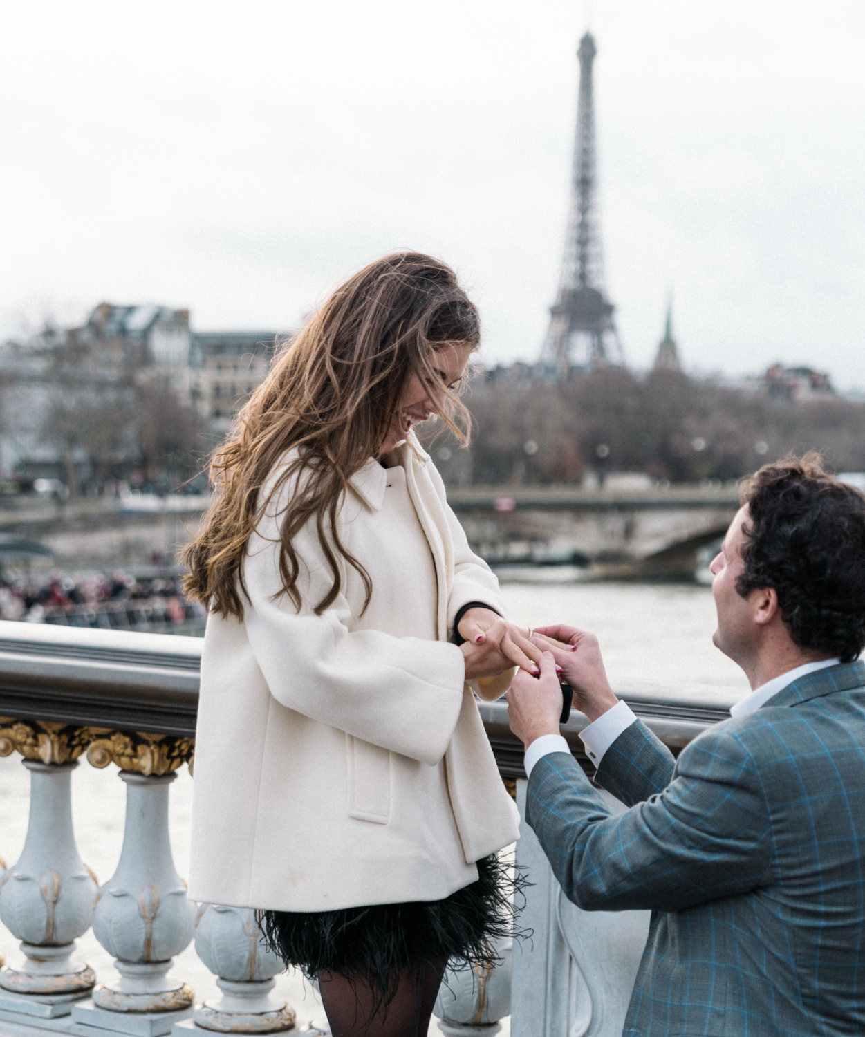 delighted woman after surprise proposal in paris