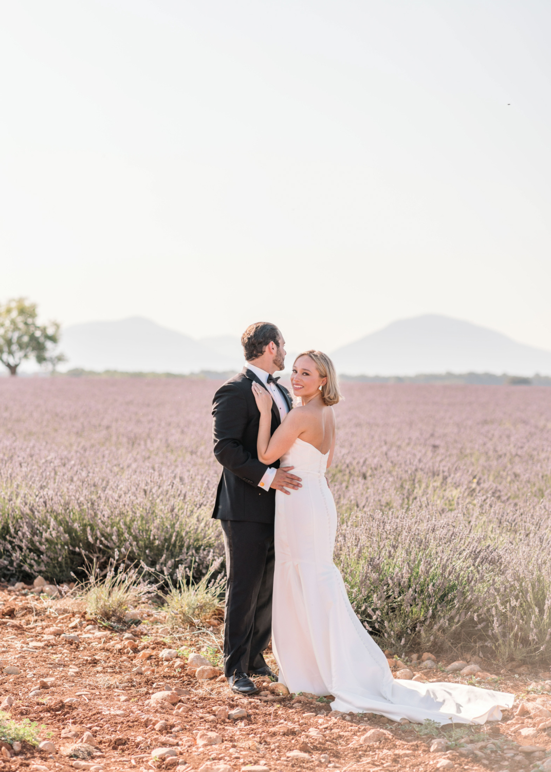 bride smiles after her wedding in lavender field in provence france