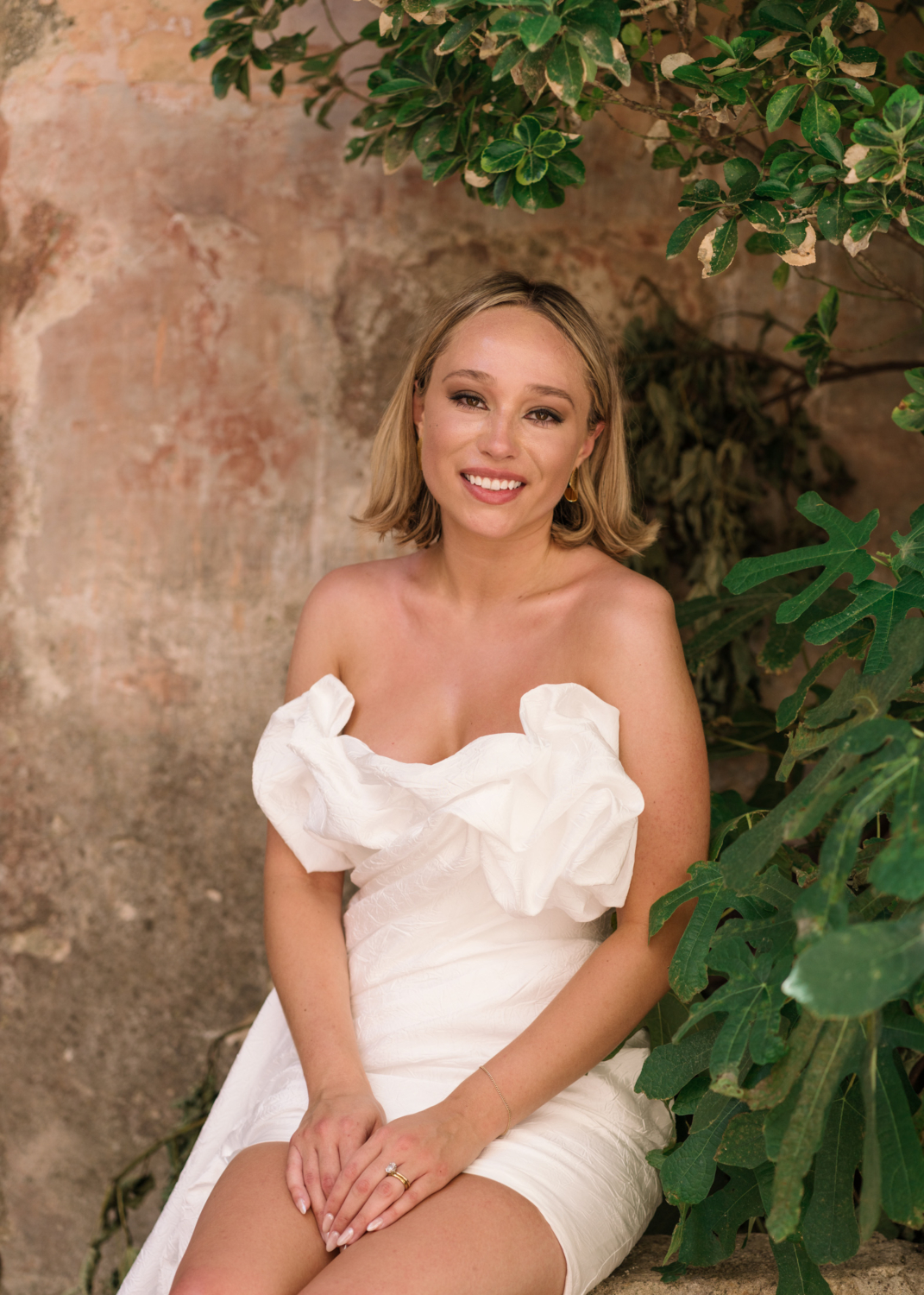 bride poses on her wedding day in gordes france