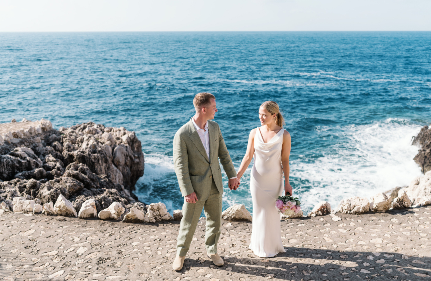 bride and groom smile at saint jean cap ferrat