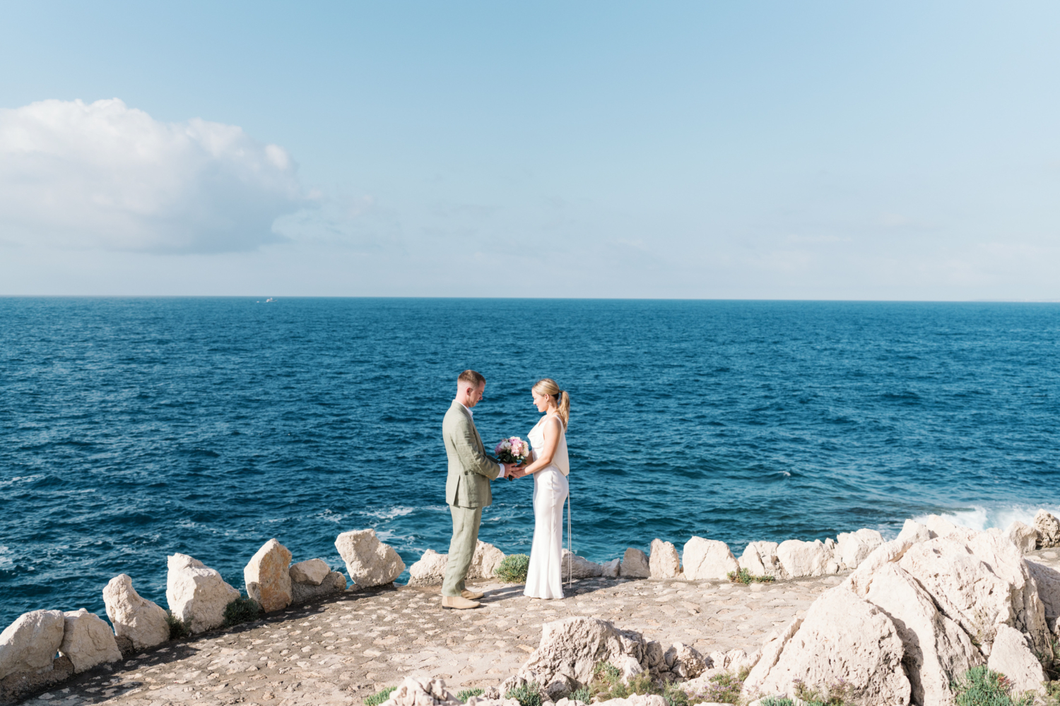 bride and groom exchange vows on the french riviera