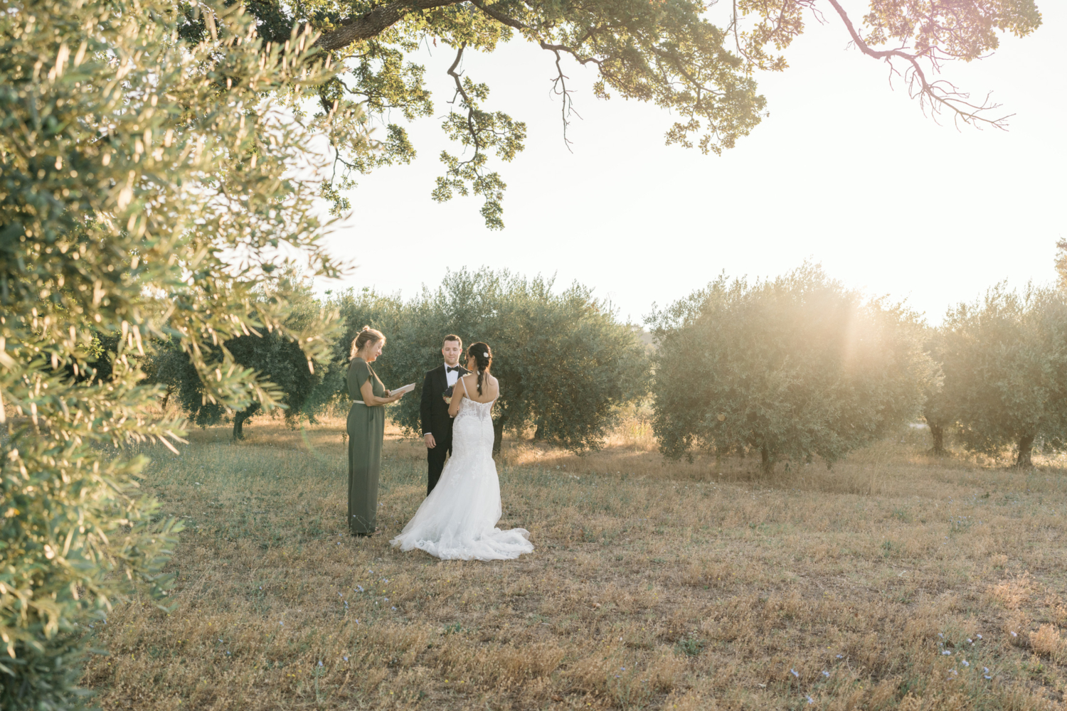 sunrise wedding ceremony in olive grove in gordes france