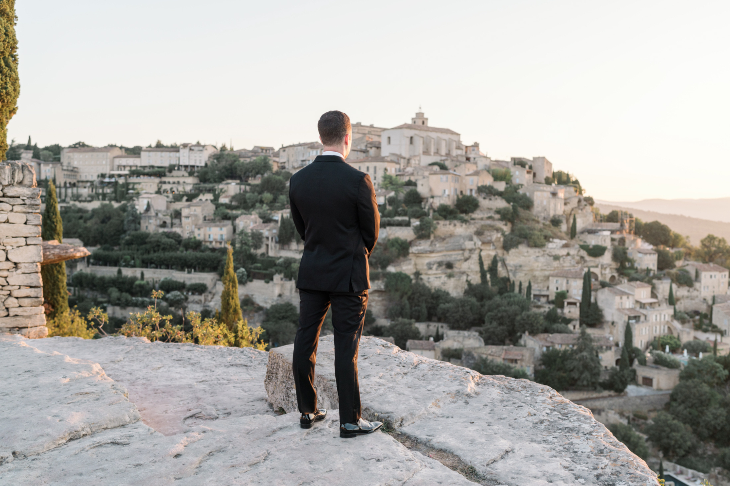 groom waits for bride at sunrise in gordes france