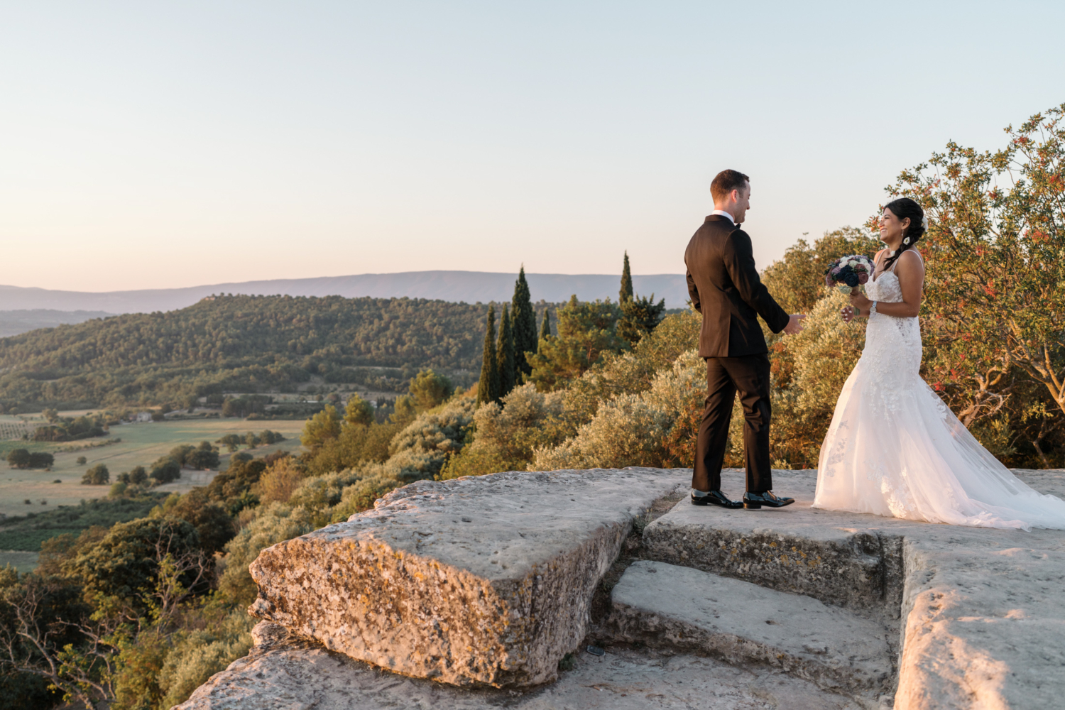 bride walks to groom for first look in gordes france