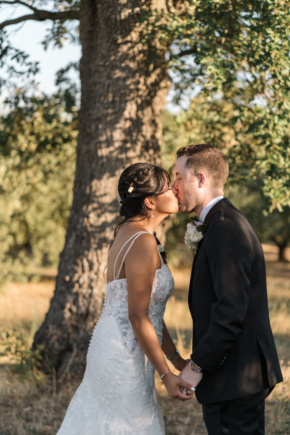 bride and groom first kiss in gordes france