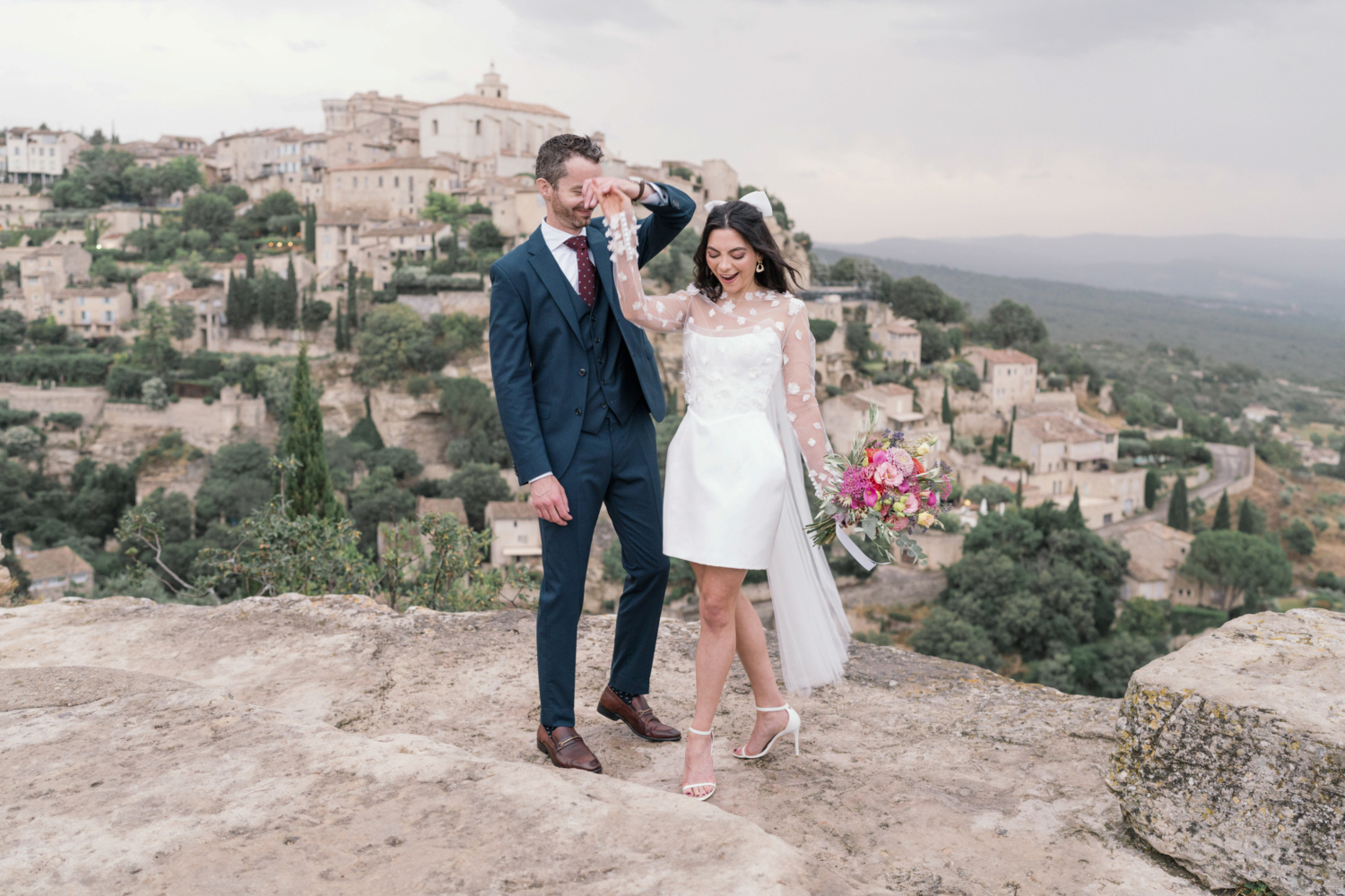 bride and groom dance in gordes france