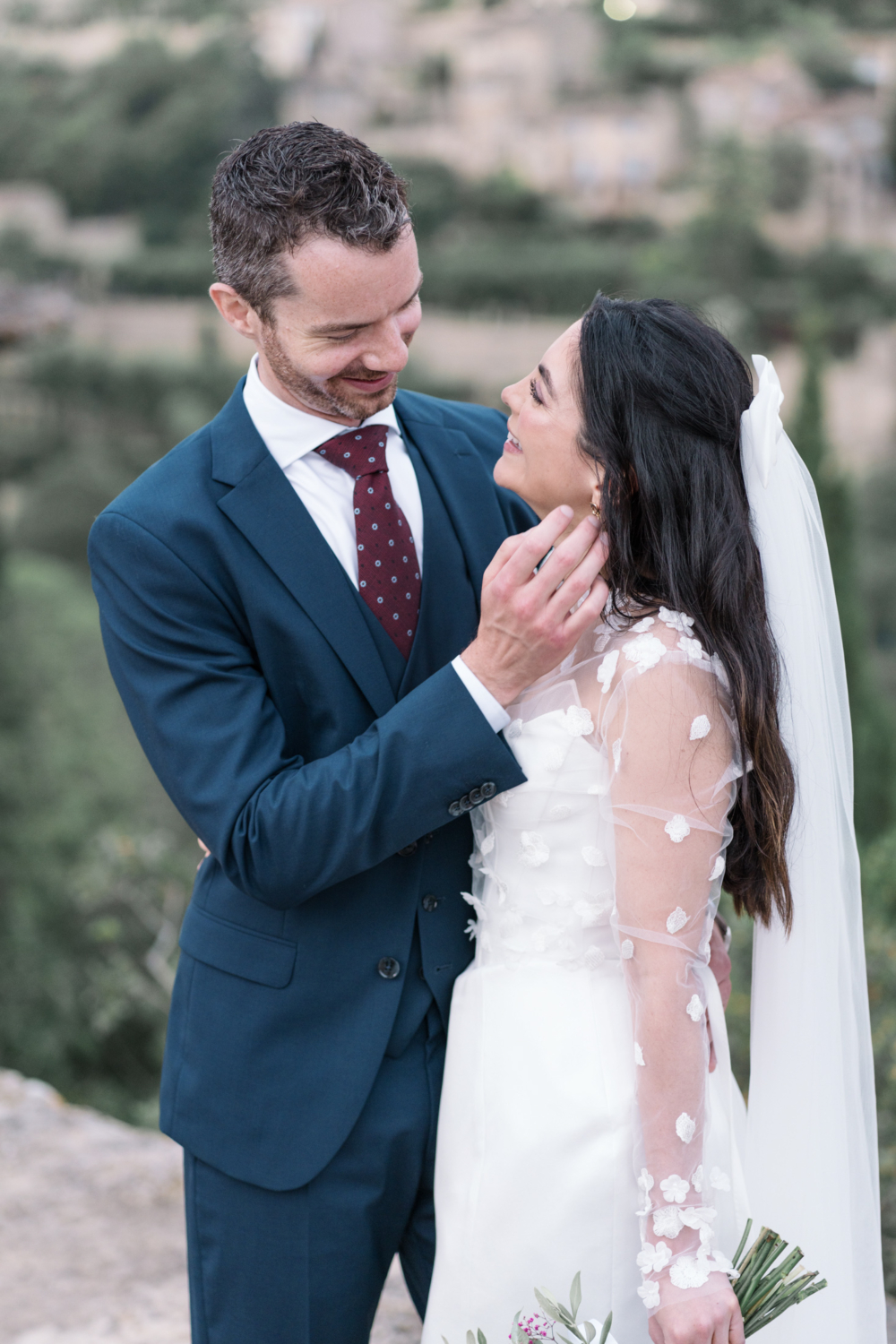 bride and groom share a laugh in gordes france