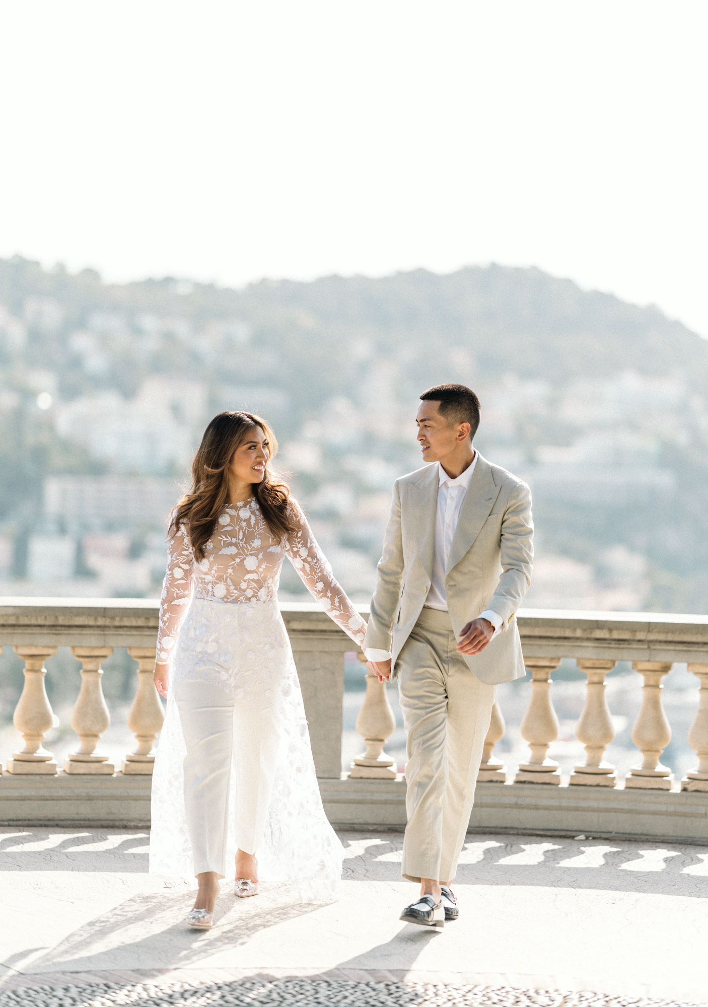 smiling couple on a walk in nice france