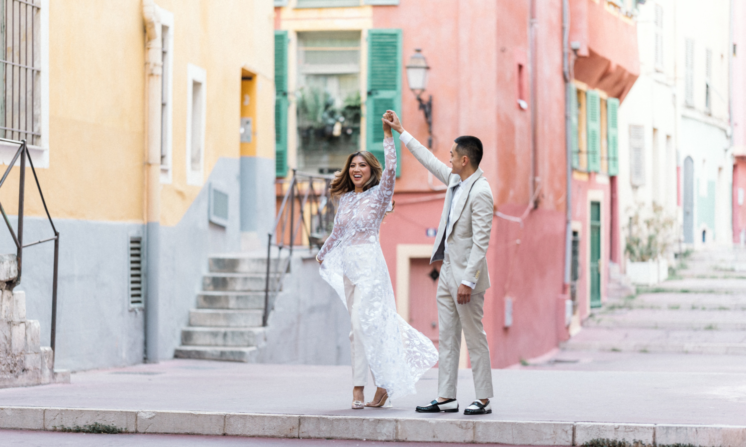 engaged couple dance in old town in nice france