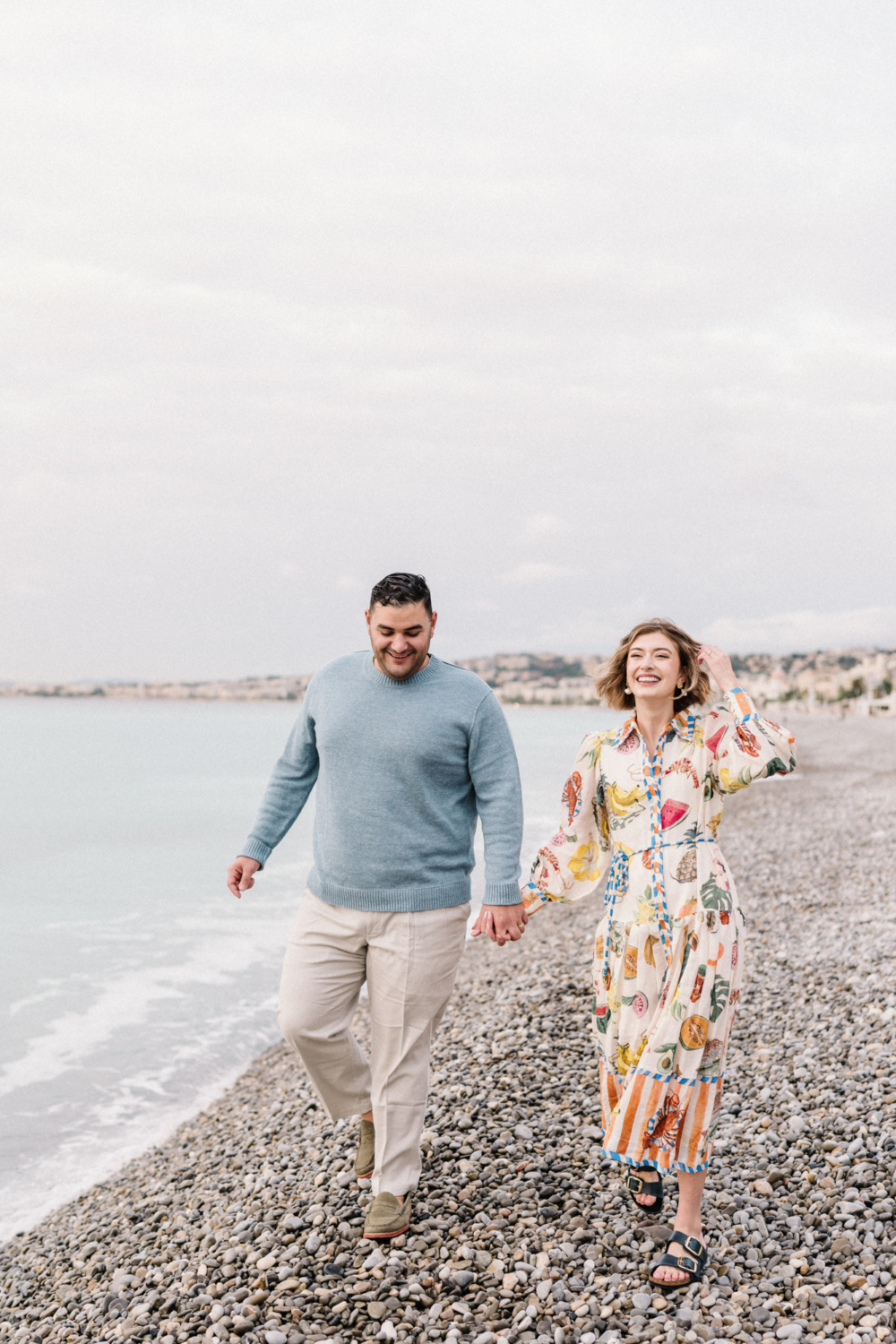 laughing couple on beach in nice france