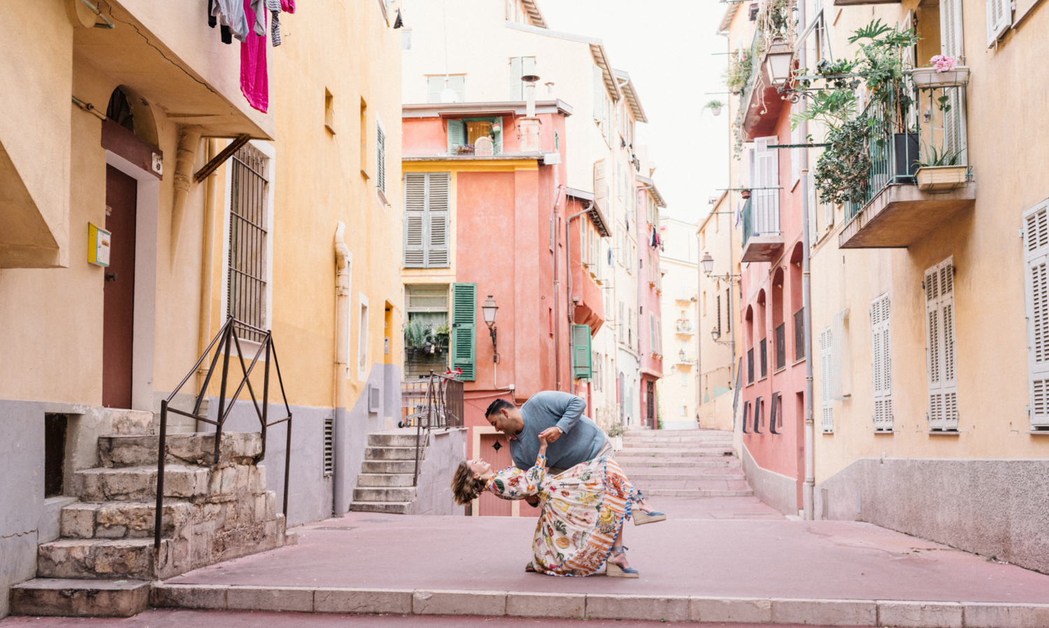 man dips woman in old town nice france