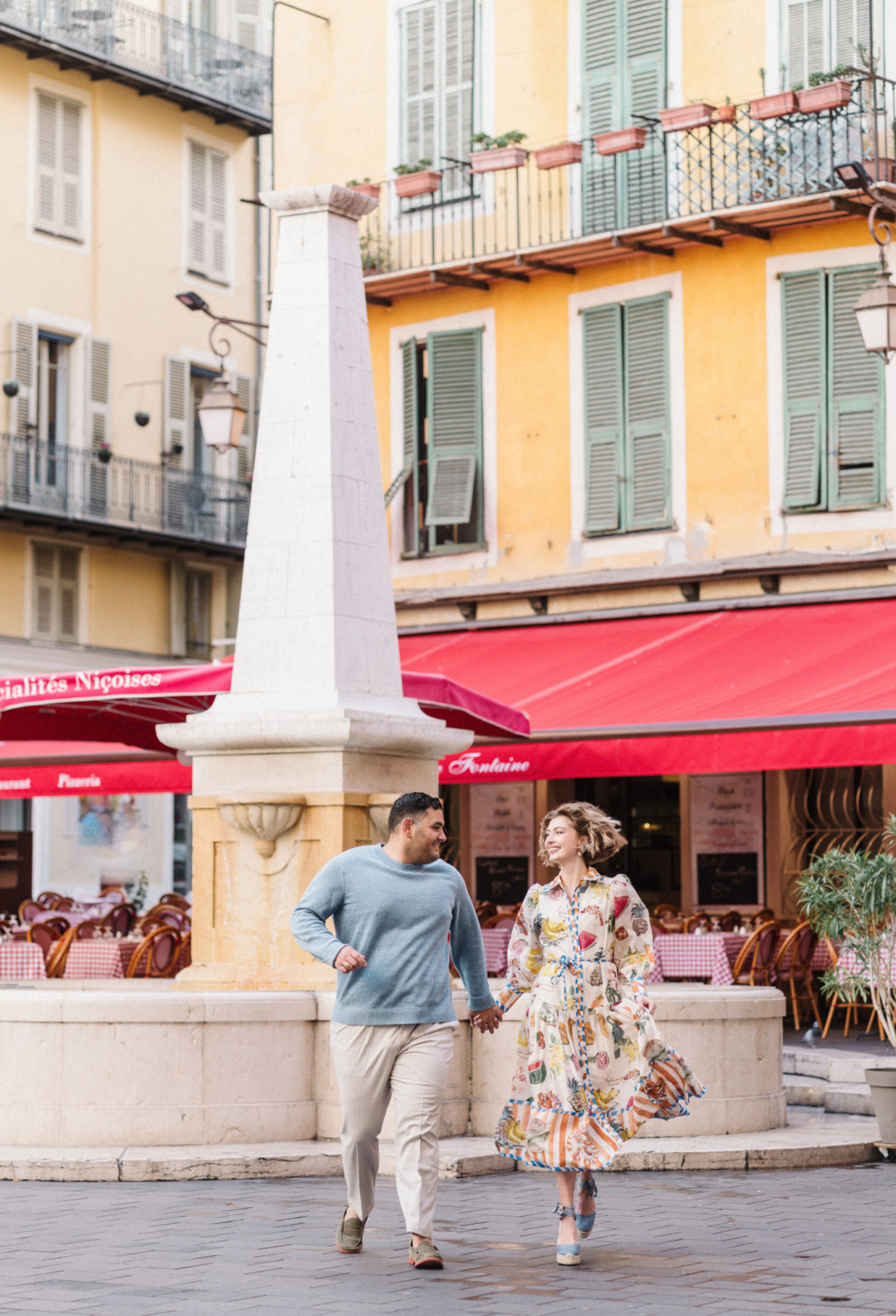 couple runs in vieux nice, france