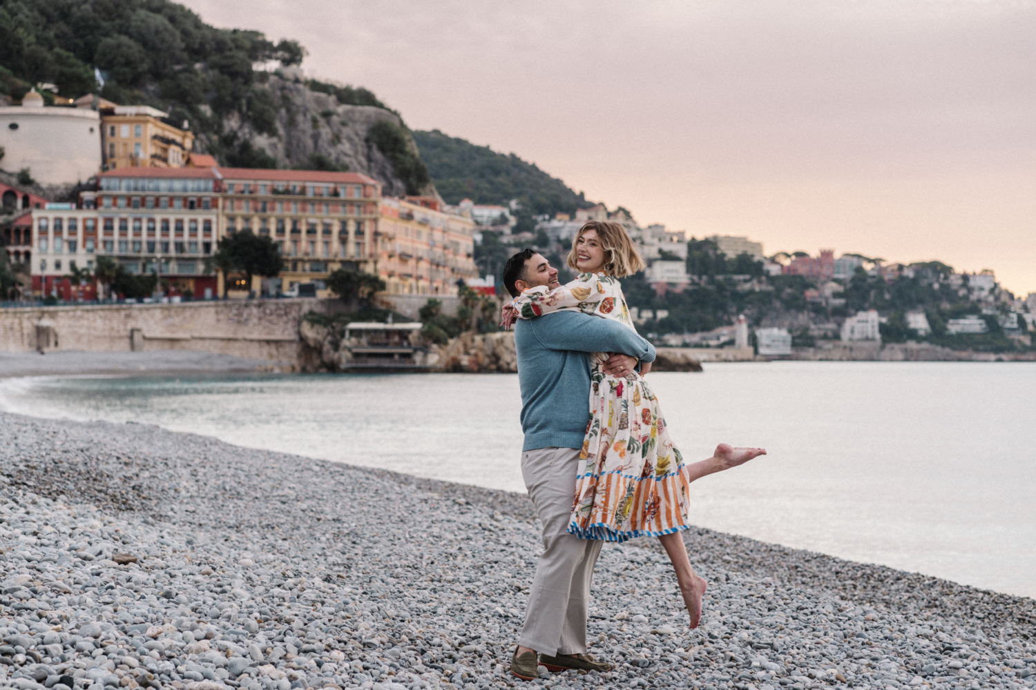 happy woman on beach in nice france