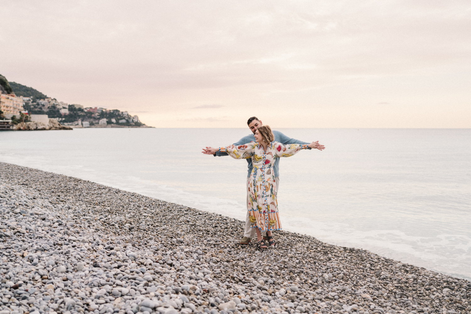 man and woman holds arms in nice france