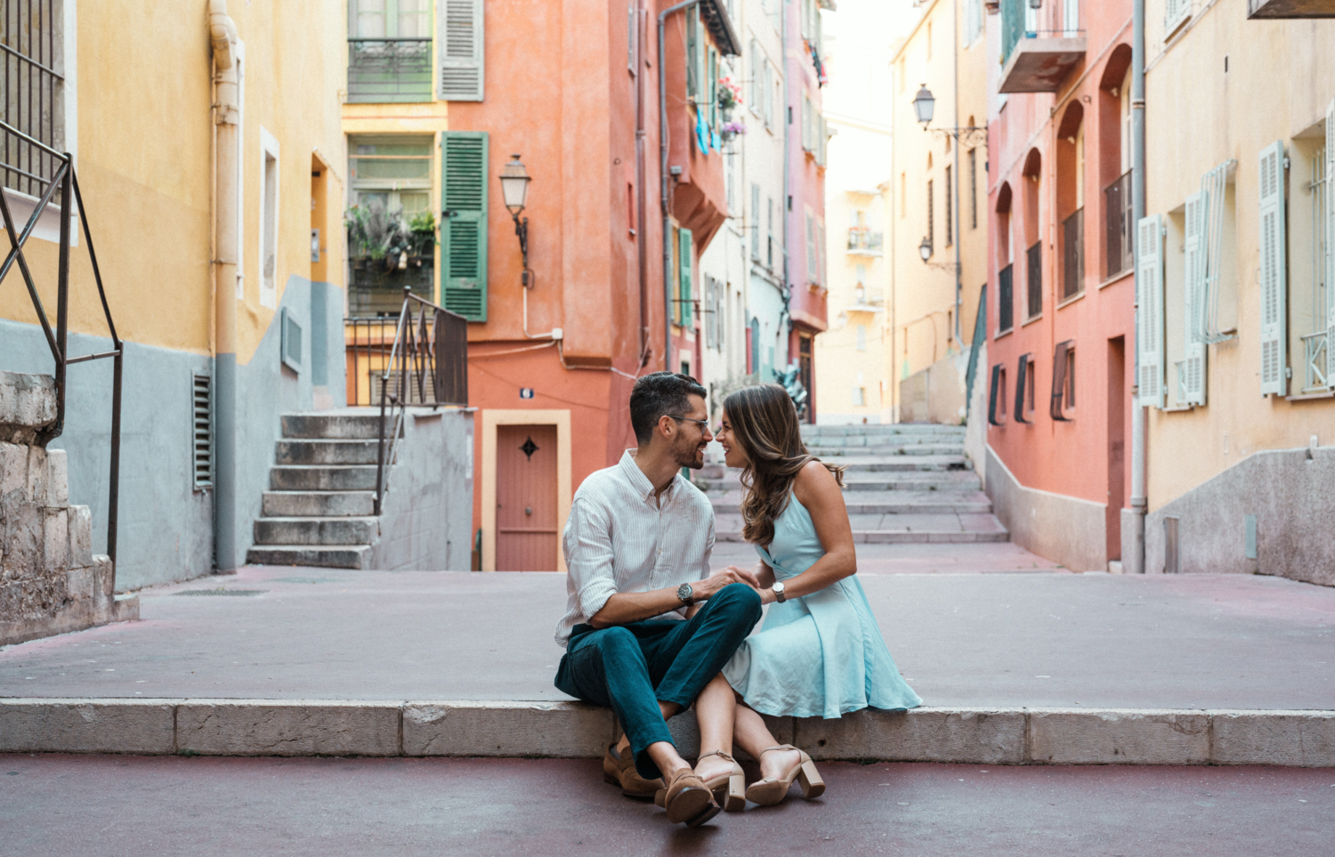 cute couple has some laughs in old town nice france