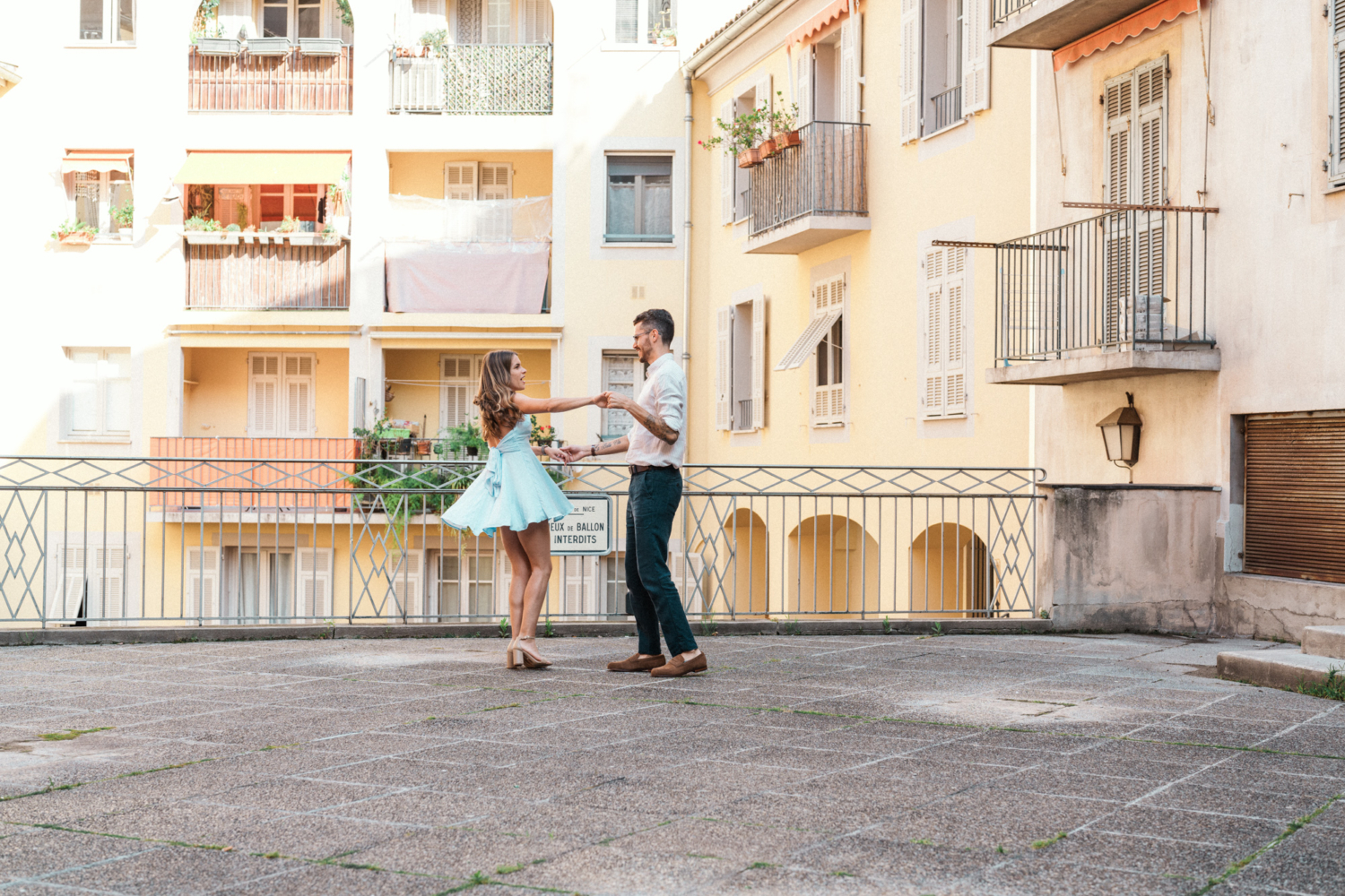 newlywed couple dance in old town nice