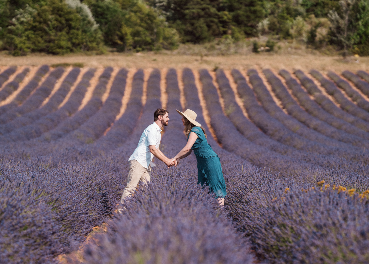 Cute couple posing in a lavender field
