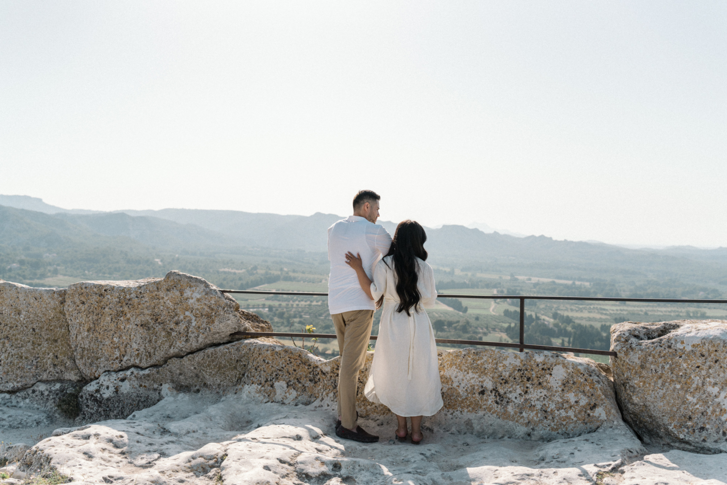 man and woman look at scenery in les baux de provence