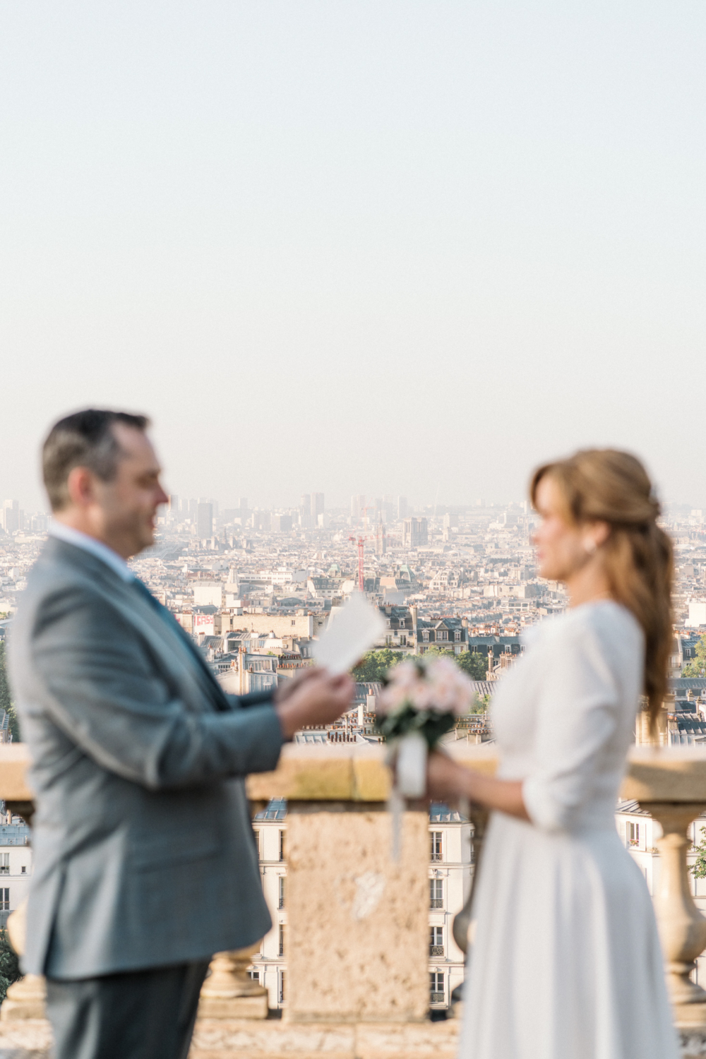 couple exchange wedding vows in paris