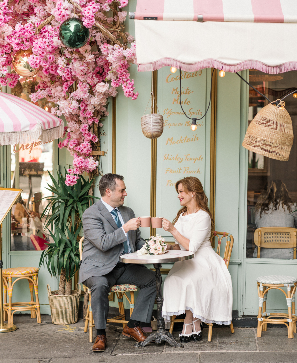 newlyweds toast each other with coffee