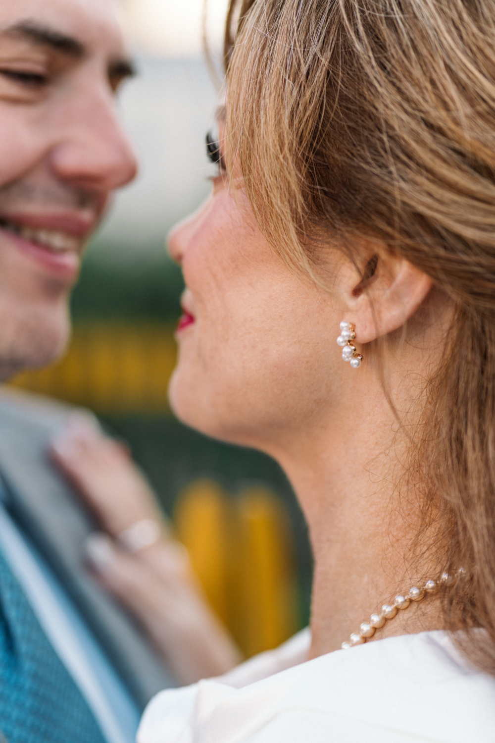 bride and groom embrace in paris