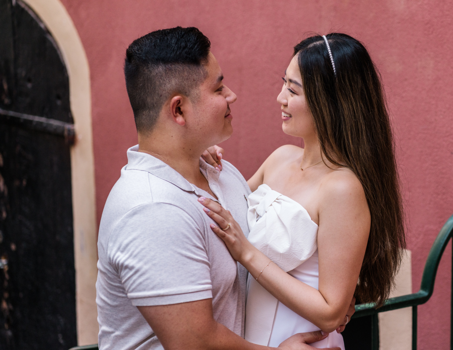 newlywed couple smile at each other in nice france