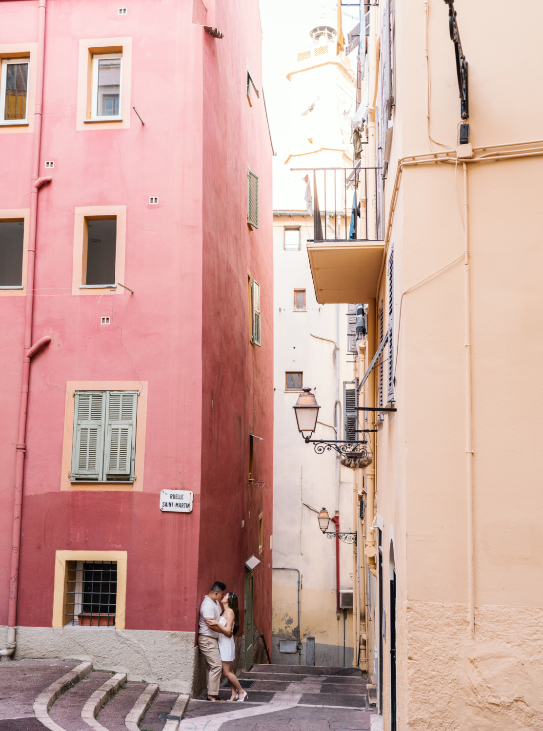 romantic kiss by newlywed couple in nice france