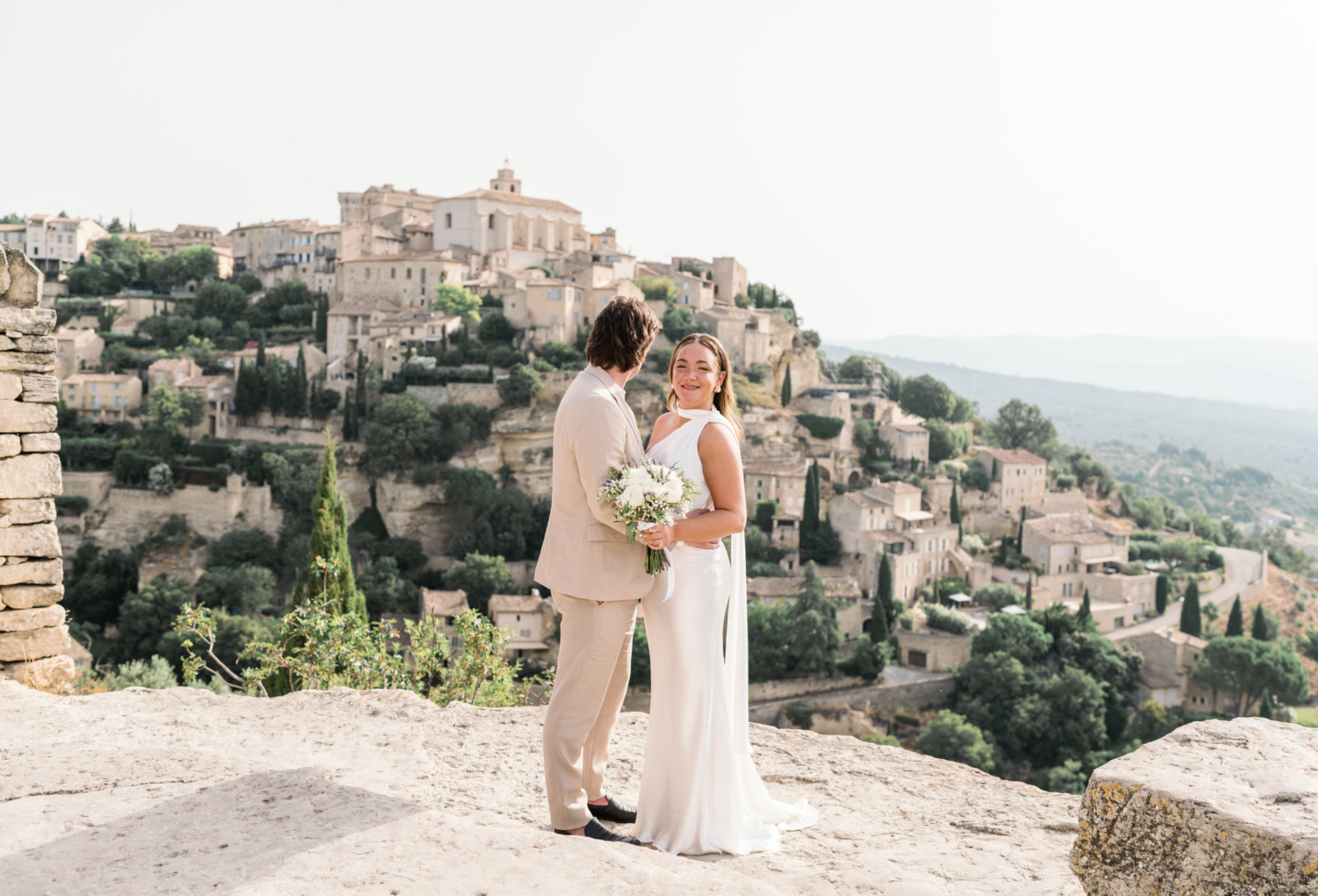 bride smiles after her wedding in gordes france