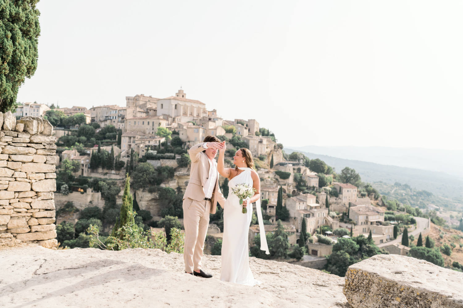 bride and groom dance in gordes france