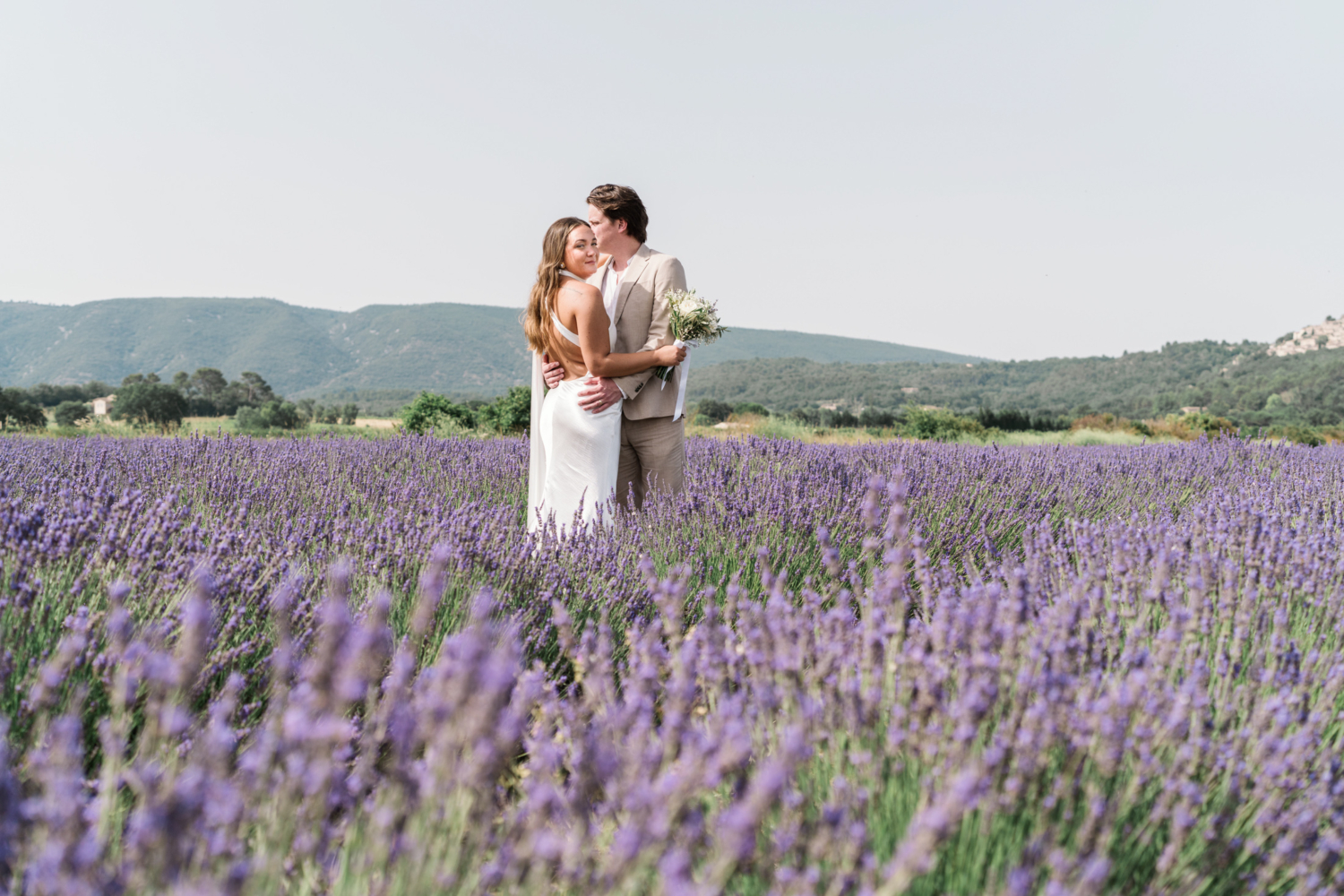 bride smiles in lavender field in provence france