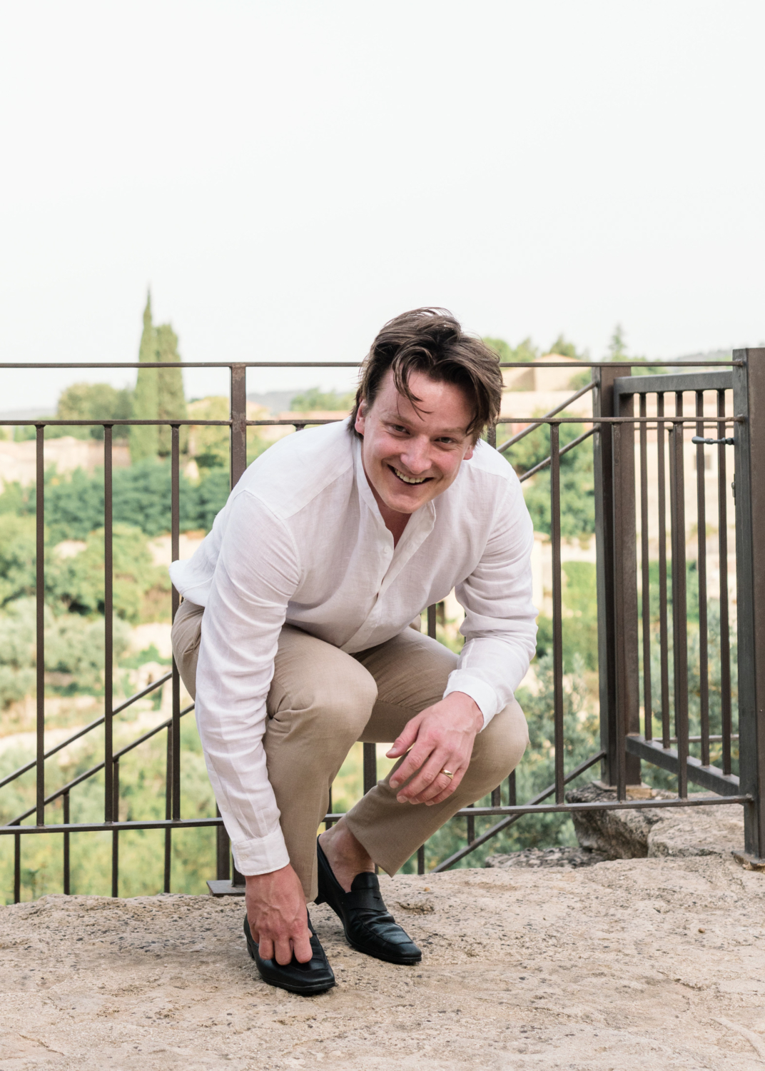 groom gets ready for his wedding in gordes france