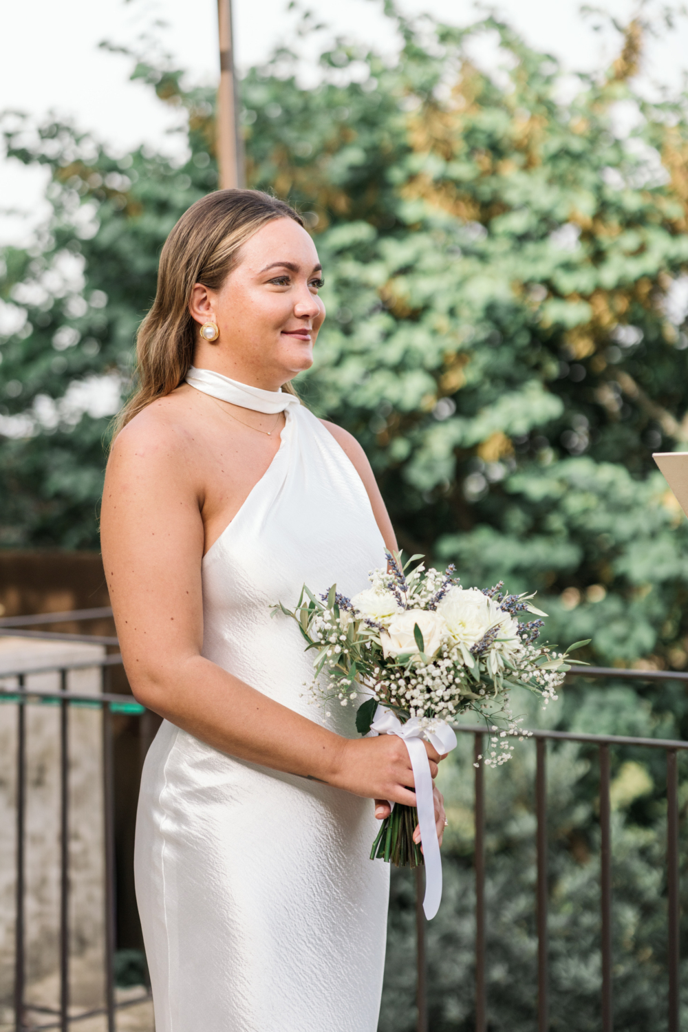 bride smiles at her wedding ceremony in gordes france