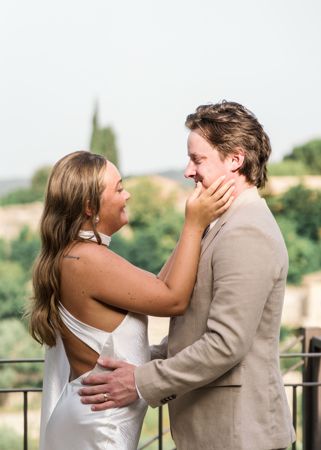 bride and groom smile at each other after elopement ceremony in gordes france