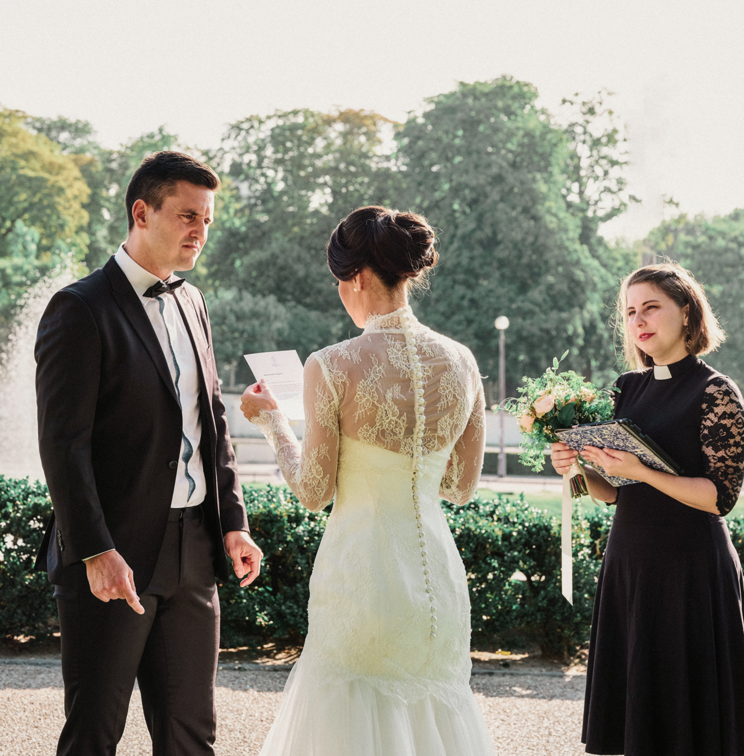 bride reads vows to groom at their elopement in paris