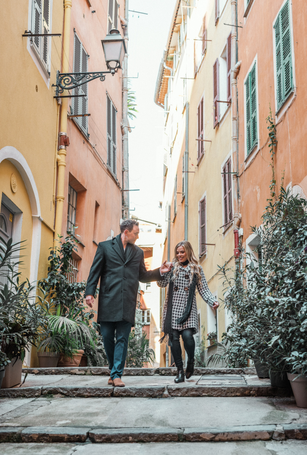 newlywed walk down stairs in old town nice france