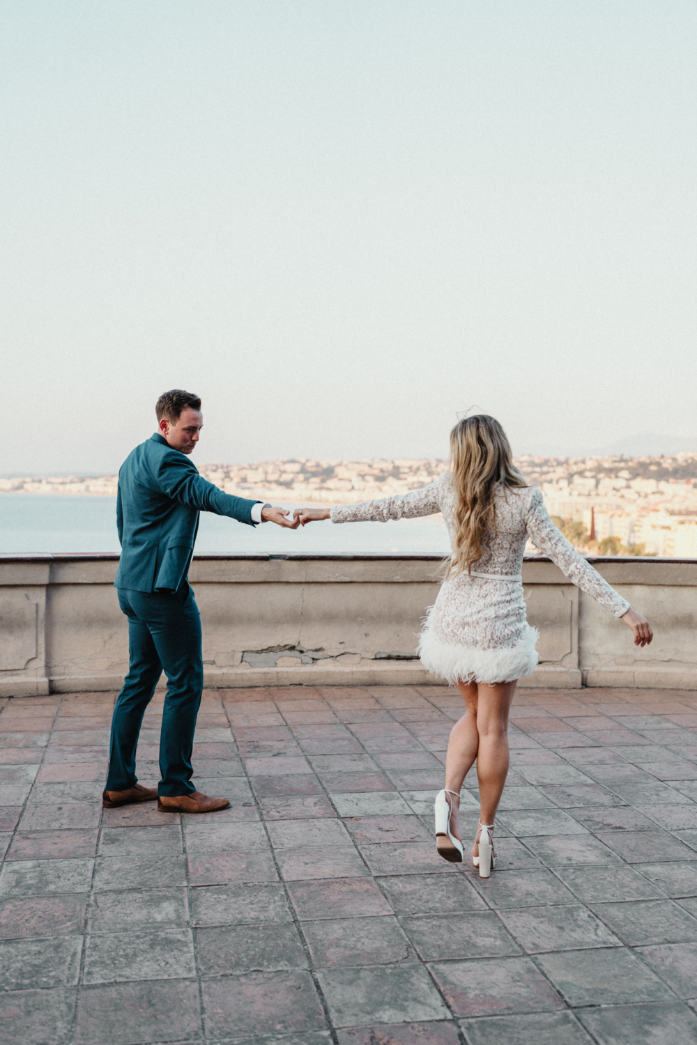 couple dancing with view of sea in nice france