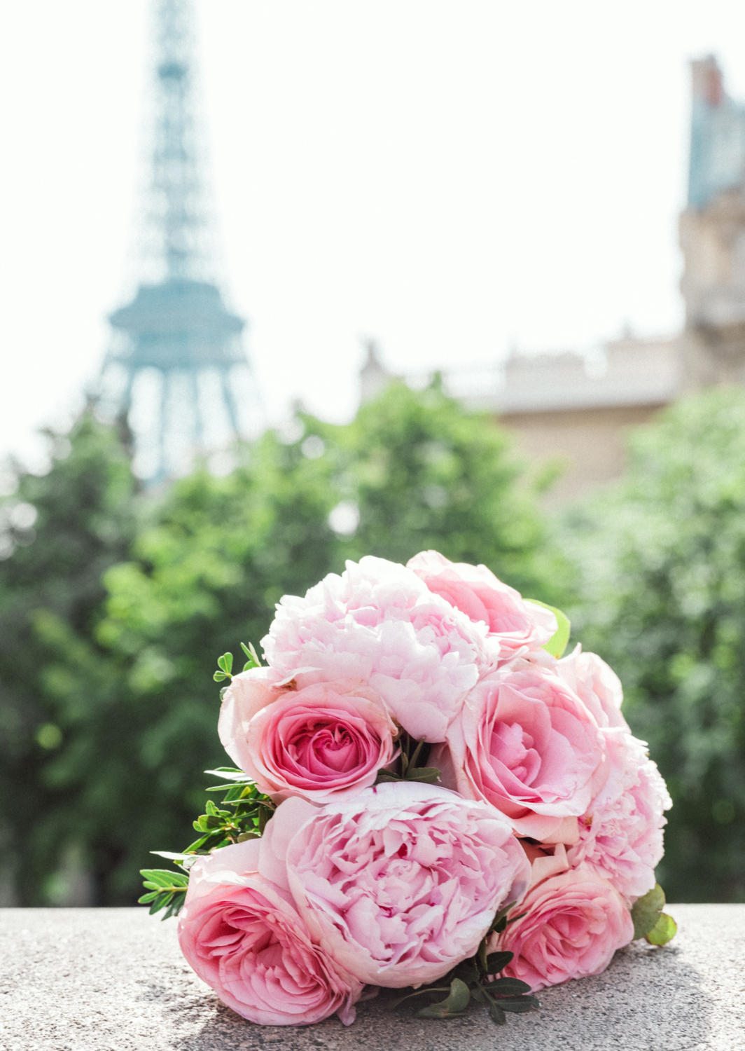 bridal bouquet with view of eiffel tower