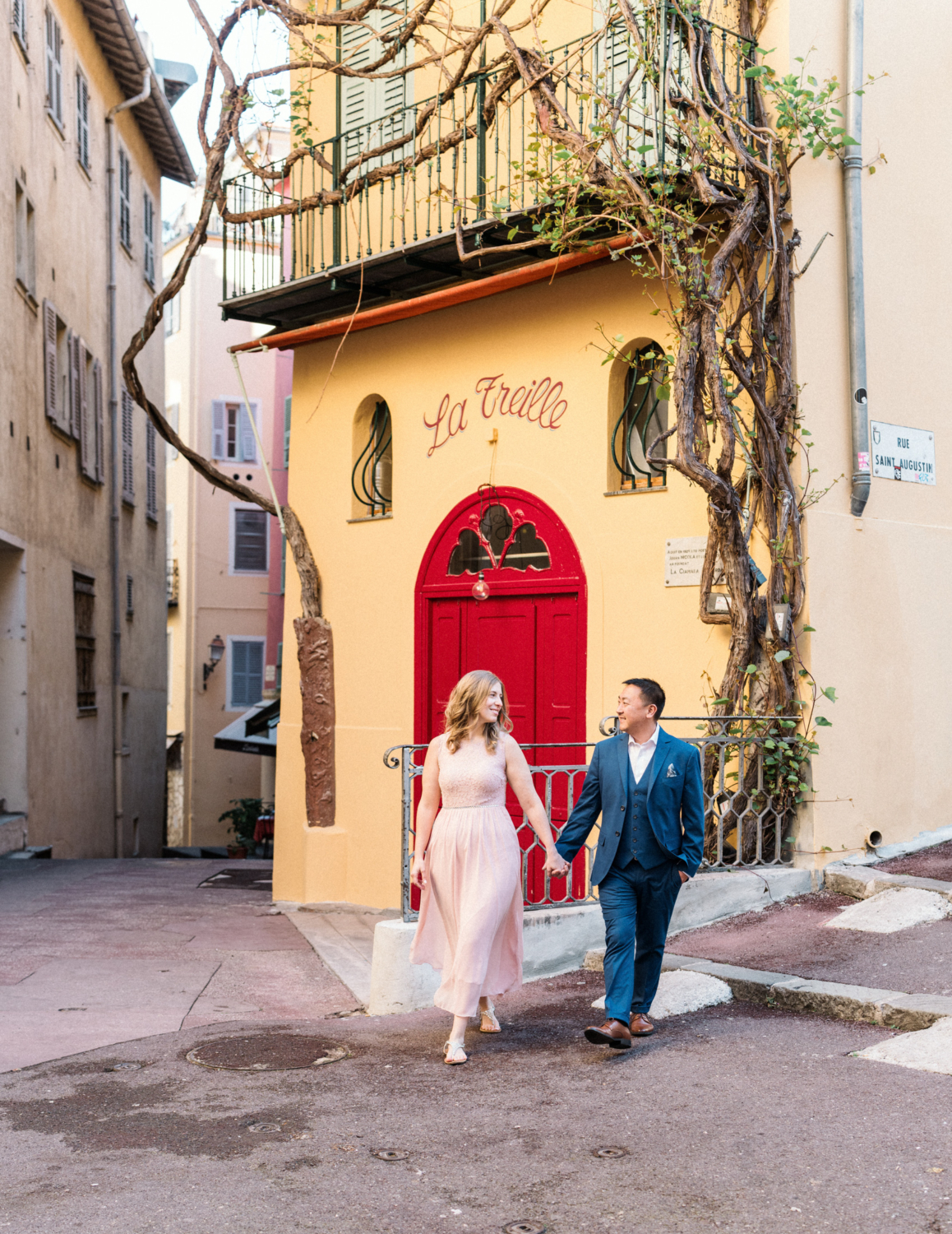 beautiful couple walk together in nice, france