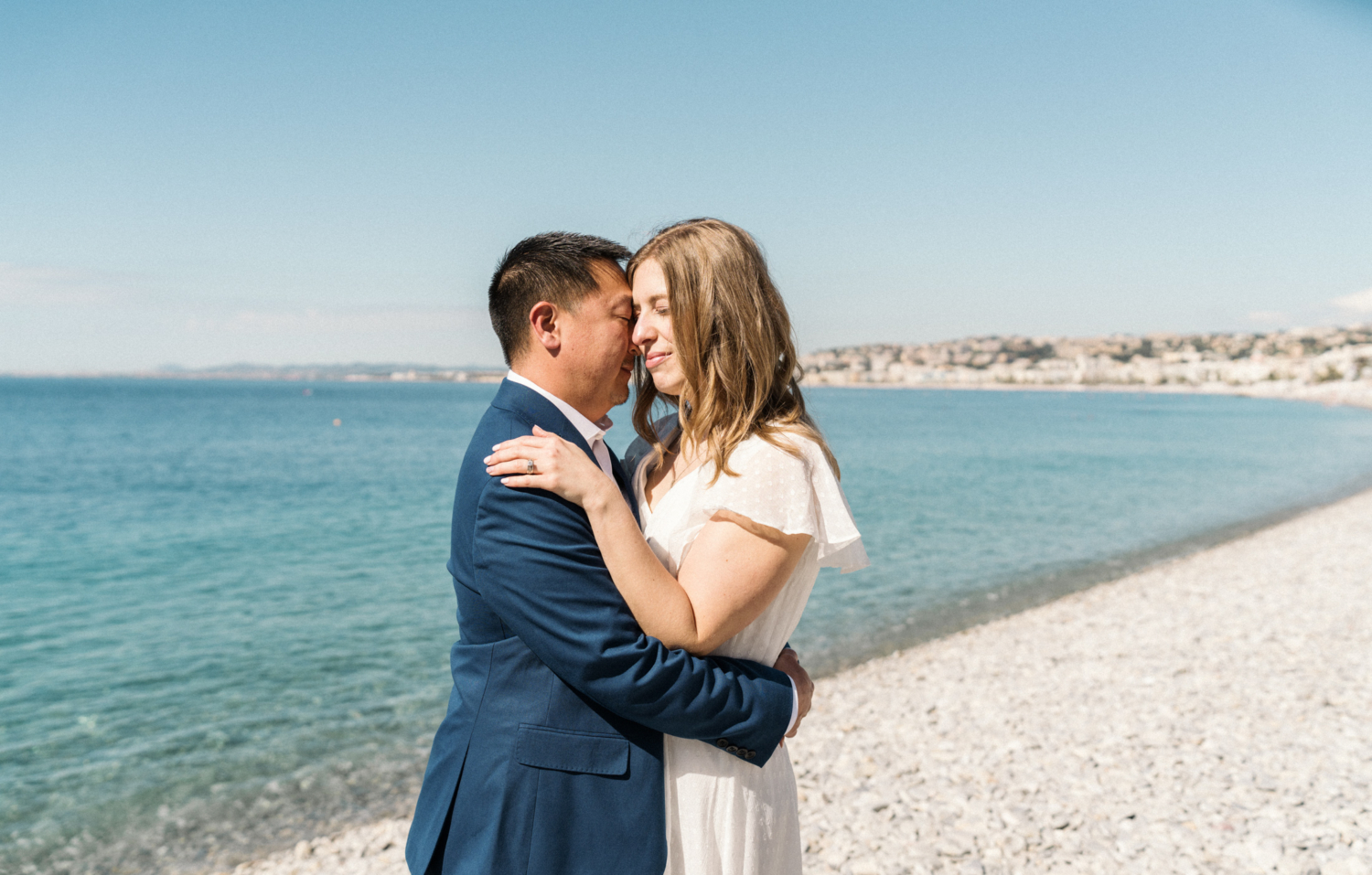 cute couple embrace in nice, france