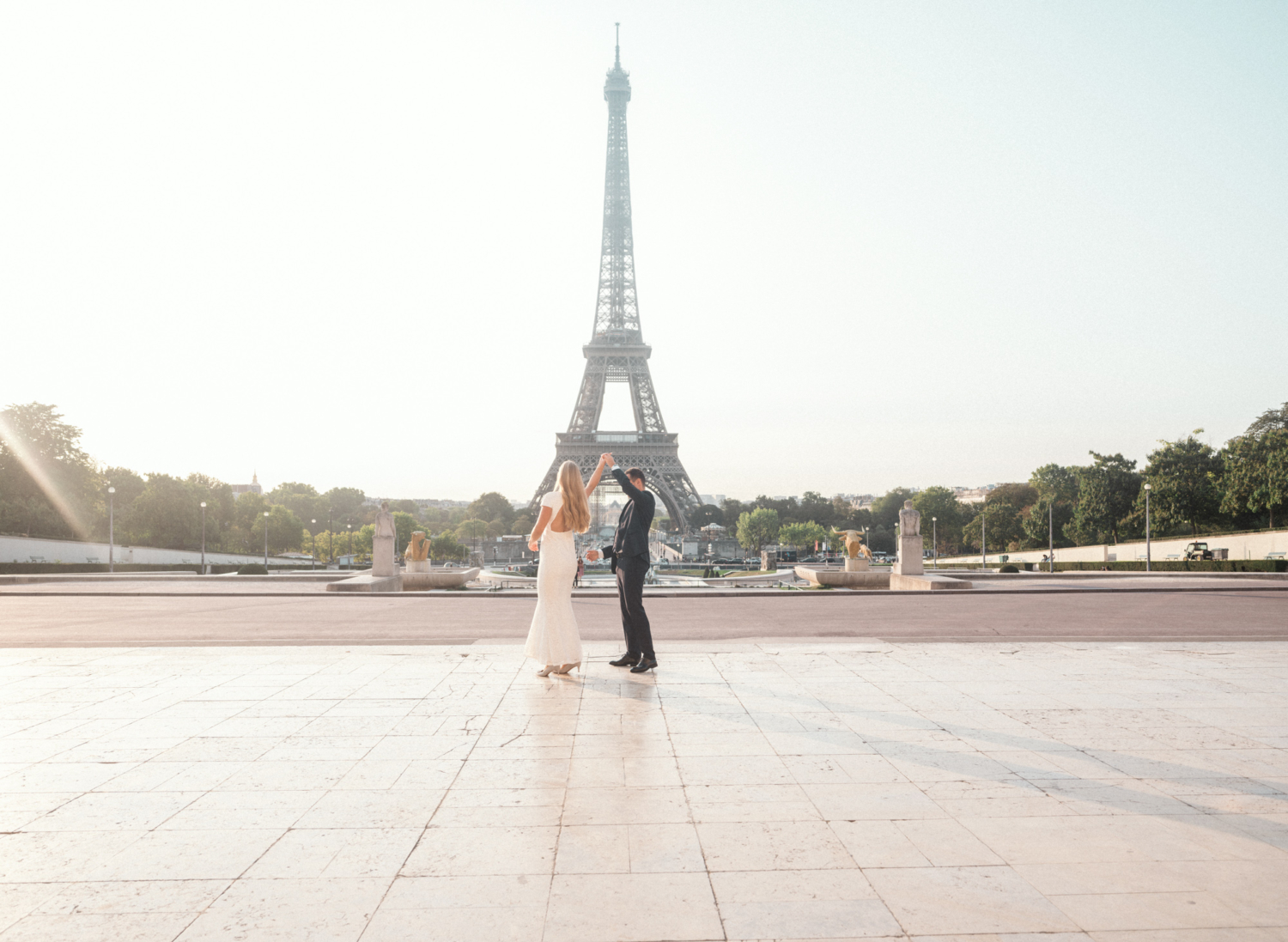 bride and groom dance at trocadero eiffel tower