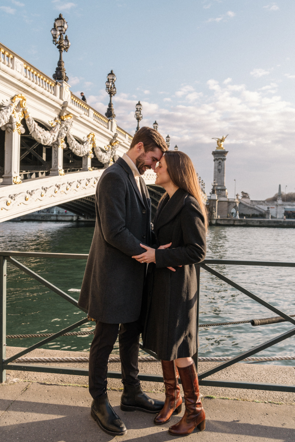 newly engaged couple pose in paris